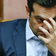 Greek Prime Minister Alexis Tsipras gestures during a parliamentary session in Athens, Greece June 28, 2015.